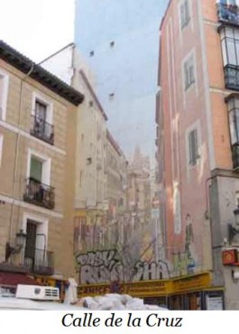 Medianera imitando la calle en perspectiva con edificios